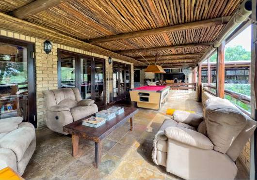 Covered lounge with pool table
